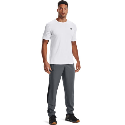 Under Armour Men VITAL WOVEN PANTS, Comfortable and windproof tracksuit bottoms, breathable and robust jogger bottoms with practical zip