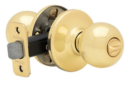 Kwikset Manija tipo pomo Polo de latón pulido (Privacidad) 93001-500