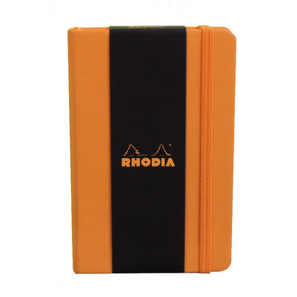 RHODIA 118068C - Rigid Notebook Webnotebook Orange - A6 - Lined - 192 pages - Clairefontaine Ivory Paper 90 g/m - Bookmark, Elastic Closure - Faux Leather Cover