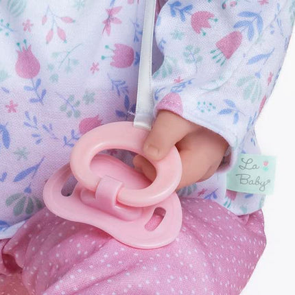 JC Toys - La Baby Muñeca de 51 cm tiene un cuerpo suave y lavable, biberón mágico y chupete, rosa y blanco, floral, diseñada en España, 2 años