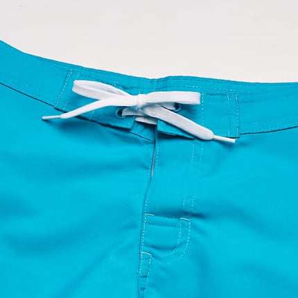 Kanu Surf Short de bain-paréo de plage à séchage rapide Sassy UPF 50+ pour fille, Sassy Aqua Solid, 8-10