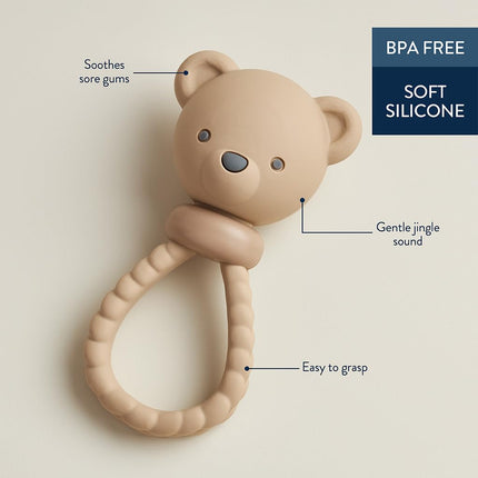 Itzy Ritzy Silicone Rattle Toy - Soothing Teething Toy with Soft Jingle Sound and Easy Grip Textured Handle - Ages 3 Months and Up (Ear)