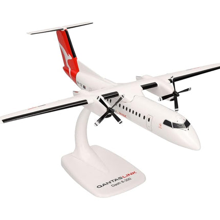 herpa 614221 Snap-Fit Model Plane QantasLink DHC-8-300 - VHTQZ Bundaberg Miniature 1:100 Scale Collectable Model with Base, Plastic Miniature Model, White, Red
