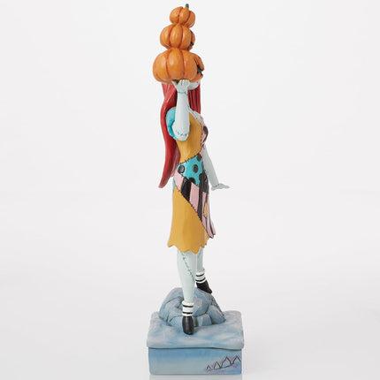 Enesco Disney Traditions by Jim Shore The Nightmare Before Christmas Sally Holding Pumpkins Figurine, 9.06 Inch, Multicolor