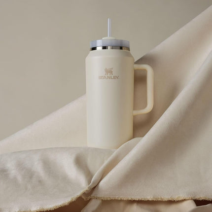 STANLEY Quencher H2.0 FlowState Stainless Steel Vacuum Insulated Tumbler with Lid and Straw for Water, Iced Tea or Coffee, Smoothie and More, Cream 2.0, 64oz