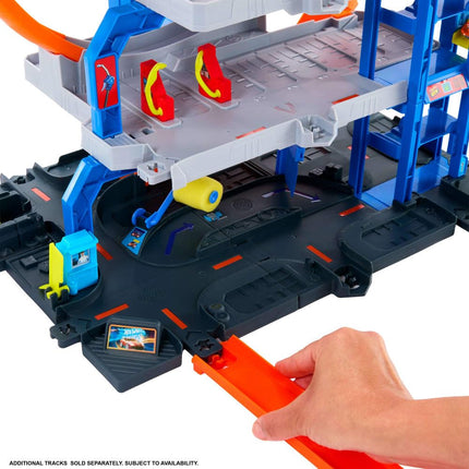 Hot Wheels Mega Loop Garage Track Set with Toy Car & Helicopter