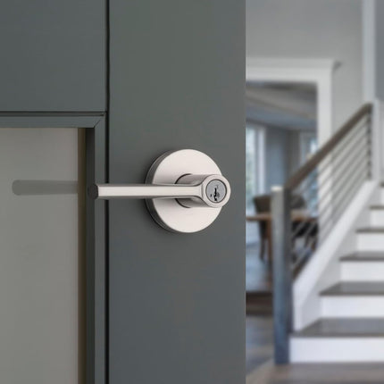 Kwikset Lisbon Round Entry Door Knob with Lock and Key, Secure Keyed Handle Exterior, Front Entrance and Bedroom, Satin Nickel, Pick Resistant SmartKey Rekey Security and Microban