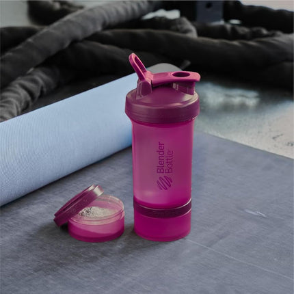 BlenderBottle Vaso mezclador con organizador de pastillas y almacenamiento para proteína en polvo, sistema ProStak clásico V2, 650 ml, color ciruela