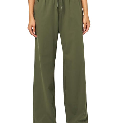 Pantalon Under Armour Motion Open Hem pour femme, (391) Marine Od Green / Baroque Green, XL