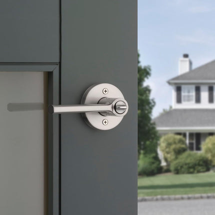 Kwikset Lisbon Round Entry Door Knob with Lock and Key, Secure Keyed Handle Exterior, Front Entrance and Bedroom, Satin Nickel, Pick Resistant SmartKey Rekey Security and Microban