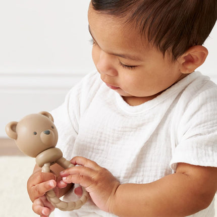 Itzy Ritzy Silicone Rattle Toy - Soothing Teething Toy with Soft Jingle Sound and Easy Grip Textured Handle - Ages 3 Months and Up (Ear)