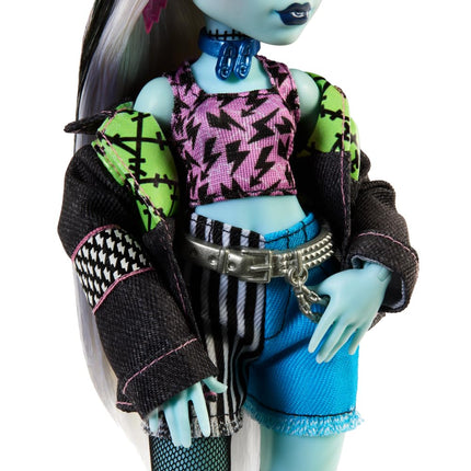 Monster High Frankie Stein Doll in Denim Jacket & Shorts, Includes Pet Dog Watzie & Accessories like a Backpack, Snack & Notebook