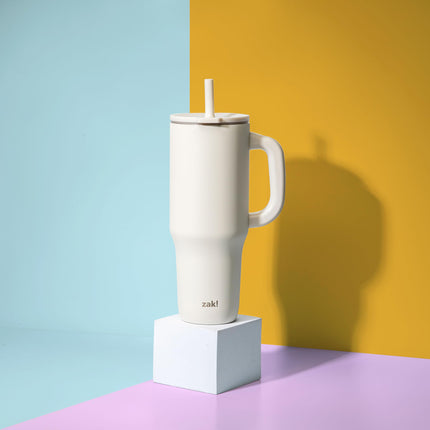 Zak Designs Sutton Travel Tumbler for On The Go, 40oz Stainless Steel with Vacuum Insulation, Silicone Straw, and Carry Handle for Cold Drinks (Cream White)