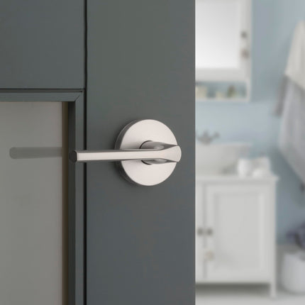 Kwikset Lisbon Interior Privacy Door Handle with Lock, Round Lever for Bathroom and Bedroom, Satin Nickel Reversible Keyless Push Button Lock Door Lever, with Microban Protection