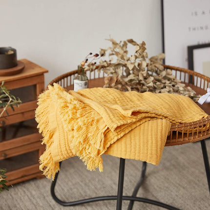 Simple&Opulence Plaid en mousseline de coton pour lit, canapé, couverture tissée en gaze avec pompons, douce, légère, confortable, prélavée, respirante, décoration de ferme pour toutes les saisons (jaune)