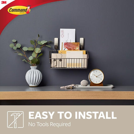 Command Medium Decorative Wall Hooks, Damage Free Hanging Wall Hooks with Adhesive Strips, No Tools Wall Hooks for Hanging Christmas Decorations, 2 Black Hooks and 4 Command Strips