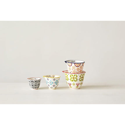 Creative Co-Op Floral Hand Stamped Stoneware Measuring Cups (Set of 4 Sizes/Designs)