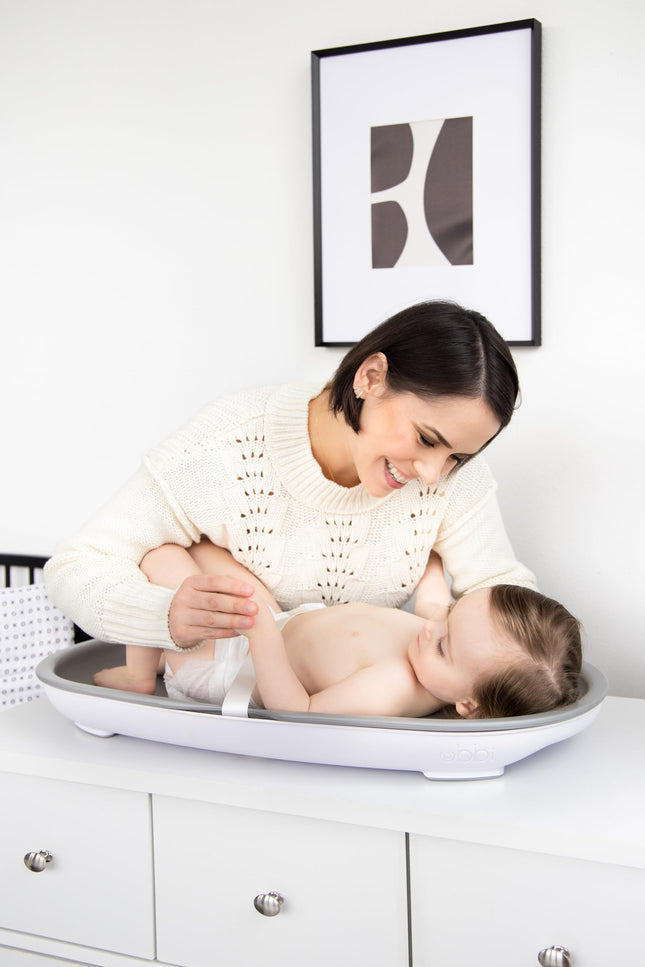Ubbi Baby Changing Pad, Easy to Clean with Detachable Base, Lightweight, Waterproof Foam, Includes Safety Strap and Non-Skid Feet, Gray