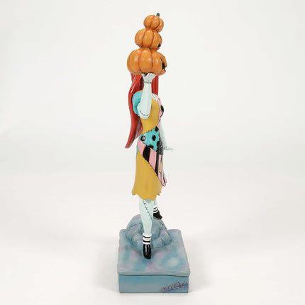 Enesco Disney Traditions by Jim Shore The Nightmare Before Christmas Sally Holding Pumpkins Figurine, 9.06 Inch, Multicolor
