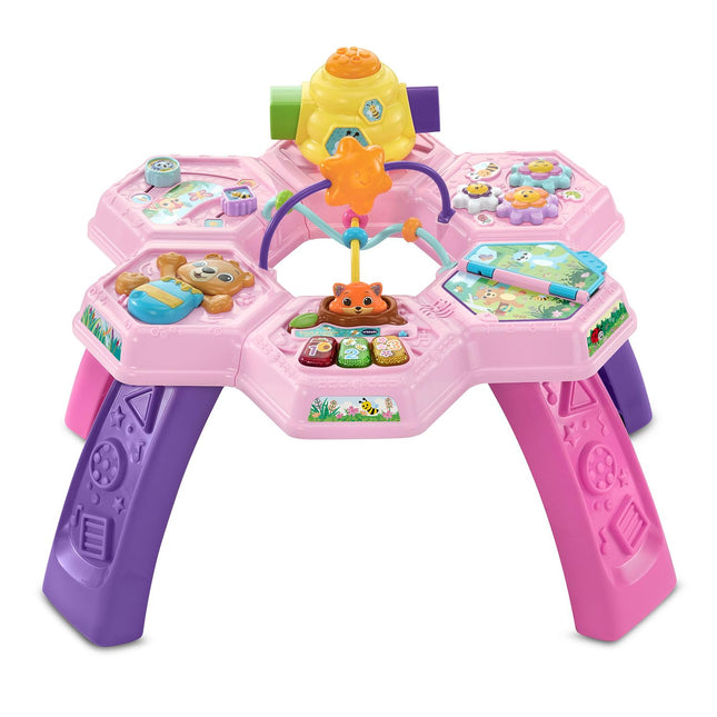 VTech Buzz and Learn activity table with seven interactive play zones, pink