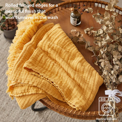 Simple&Opulence Plaid en mousseline de coton pour lit, canapé, couverture tissée en gaze avec pompons, douce, légère, confortable, prélavée, respirante, décoration de ferme pour toutes les saisons (jaune)