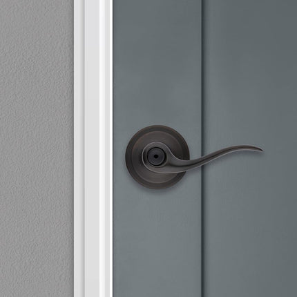 Kwikset Tustin Bed/Bath Lever in Venetian Bronze