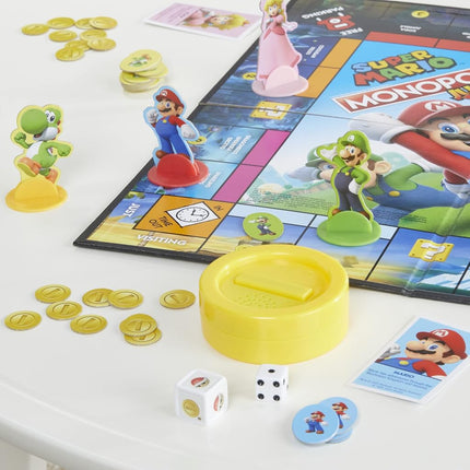MONOPOLY Junior Super Mario Edition Board Game, Fun Kids' Game Ages 5 and Up, Explore The Mushroom Kingdom as Mario, Peach, Yoshi, or Luigi