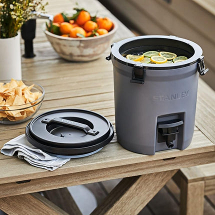 Stanley Adventure Fast Flow Water Jug 2 Gallon | Leakproof Ice Water Dispenser | Insulated Beverage Cooler | Easy Pour Spigot and Latched Foam Lid | BPA-Free | Dried Pine