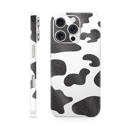 Cubierta protectora de vinilo brillante con purpurina para iPhone 16 Pro - Estampado de vaca - Calcomanía de vinilo 3M de primera calidad - Fácil de aplicar | Fabricado en EE. UU. por MightySkins