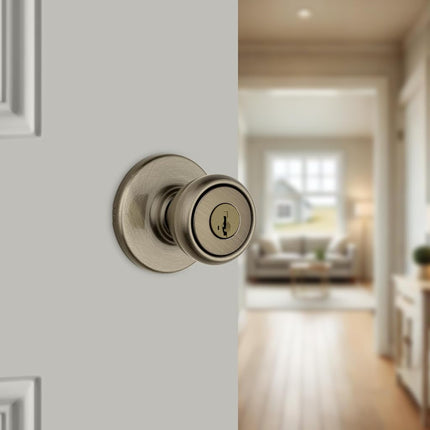 Kwikset Tylo Keyed Entry Door Knob with Microban Antimicrobial Protection Featuring SmartKey Security in Antique Brass (94002-854)