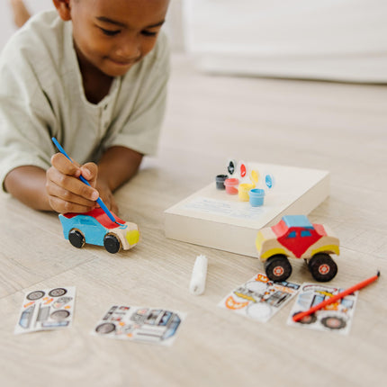 Melissa & Doug Kit de manualidades de madera "Decora tu propio" - Coche de carreras y camión monstruo