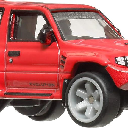Hot Wheels Premium Car Culture Collectible Toy Car, 1:64 Scale Die-Cast Mitsubishi Pajero Evolution, Terra Trek Vehicle with Real Riders Tires