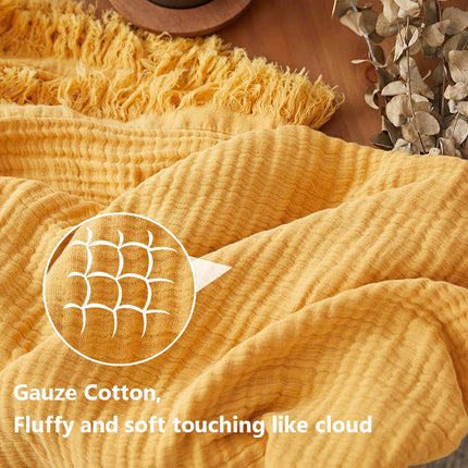 Simple&Opulence Plaid en mousseline de coton pour lit, canapé, couverture tissée en gaze avec pompons, douce, légère, confortable, prélavée, respirante, décoration de ferme pour toutes les saisons (jaune)