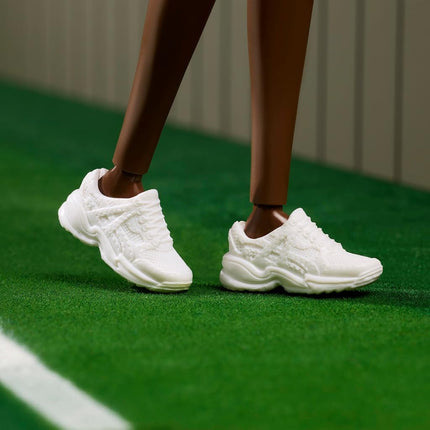 Barbie Inspiring Women Series, Venus Williams Fashion Doll With Signature Tennis Uniform and Racket, Includes Displayable Packaging, HRM49