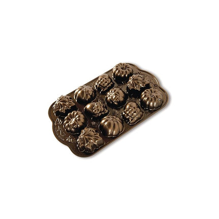 Nordic Ware Autumn Delights Cakelet Pan, 3D Cast Aluminium Bundt Tin, Bundt Cake Tin with Autumn Pattern, Premium Cake Mould Made in The USA, Colour: Bronze Transparent