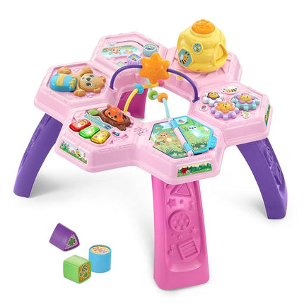 VTech Buzz and Learn activity table with seven interactive play zones, pink