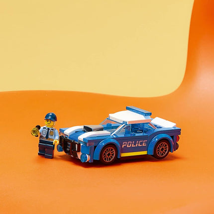LEGO City Police Car 60312 Building Kit for Kids Aged 5 and Up; Includes a Police Officer Minifigure with a Toy Flashlight and a Police Cap (94 Pieces)