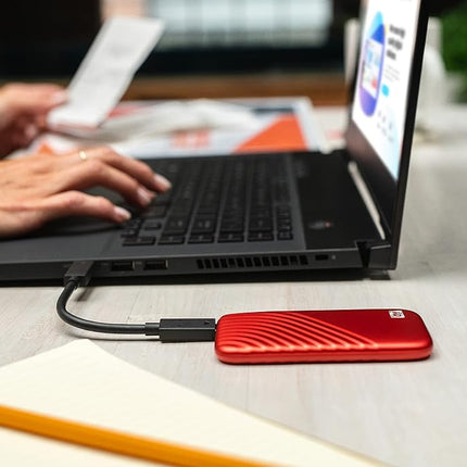WD 1TB My Passport Portable SSD, External NVMe Solid State Drive, USB-C, up to 1050 MB/s, Works with PC, Xbox and Playstation, 2-meters drop resistance, Red