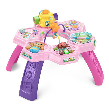 VTech Buzz and Learn activity table with seven interactive play zones, pink