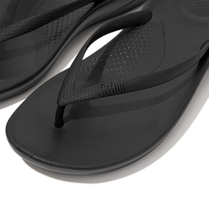 FitFlop Women's iQushion Ergonomic Flip Flops - Lightweight & Comfortable with Natural Arch Support - All Black - 7 UK