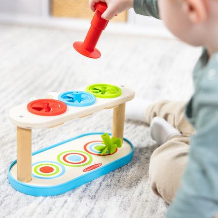 Melissa & Doug Trompos giratorios para emparejar y empujar, juguete para desarrollar la habilidad de combinar colores y la motricidad fina para niños de 2 años en adelante - Certificado FSC