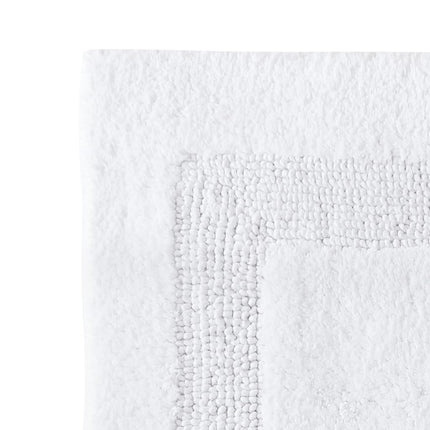 Tommy Bahama | Colección Long Branch | Alfombrilla de baño - 100% Algodón, Reversible, Fácil cuidado lavable a máquina, 21 x 34, Blanco