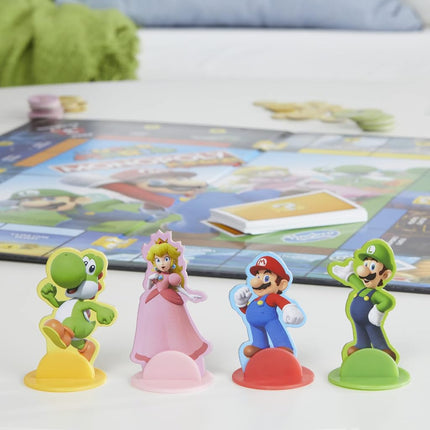 MONOPOLY Junior Super Mario Edition Board Game, Fun Kids' Game Ages 5 and Up, Explore The Mushroom Kingdom as Mario, Peach, Yoshi, or Luigi