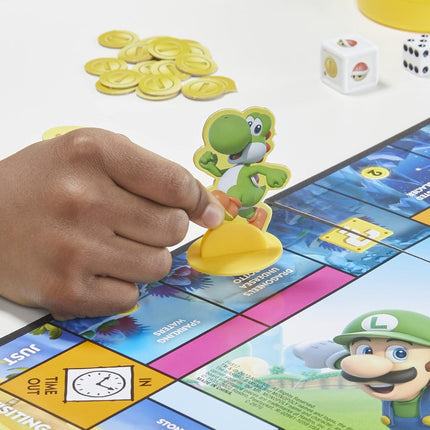 MONOPOLY Junior Super Mario Edition Board Game, Fun Kids' Game Ages 5 and Up, Explore The Mushroom Kingdom as Mario, Peach, Yoshi, or Luigi