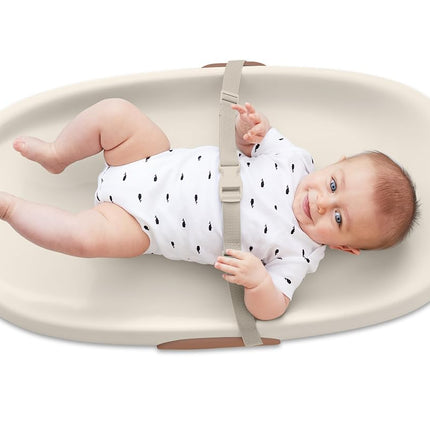 Skip Hop Oat Contoured Wipe-Clean Changing Pad with Tuck-Away Toy Bar
