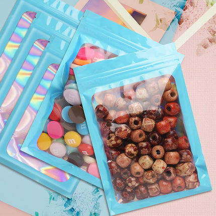Funfery 100 pcs Blue Mylar Holographic Bags Packaging Bags,Clear Sealing Resealable Smell Proof Bags Foil Pouch Zipper Bags for Food Storage,Gloss,Lash Packing for Small Business(6.3x9.4In)