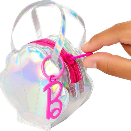 Barbie Clothes Set, Beach-Themed with Swimsuit, 5 Acessories & Zippered Doll-Sized Shell-Shaped Bag with Clip-On Ring, Iridescent