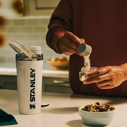 Stanley Activate Shaker Bottle 20 oz | Leakproof Insulated Stainless Steel Shaker Cup | Base Storage and Twist On Fast Flow Lid | Protein Shakes and Pre Workout Powder | BPA-Free | Black