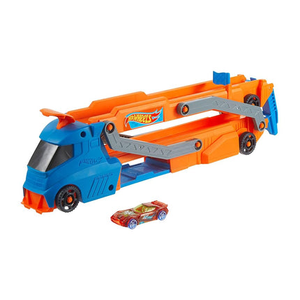 Hot Wheels Toy Car, Truck, Hauler & Track with 1:64 Scale Toy Car, Large Truck Transforms into 2.5+-ft Raceway with a Launcher, Stores up to 9 1:64 Scale Cars, Connects to Other Sets, HYT83