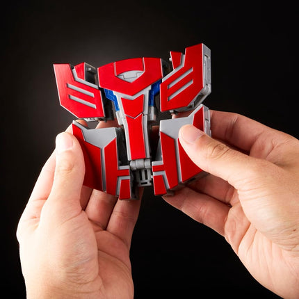 Transformers Icons Optimus Prime 6.75-Inch Voyager Class Action Figure that Converts to Autobot Logo Symbol, Display Stand, Robot Toys for Ages 8+